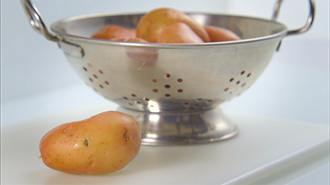 Potatoes and colander