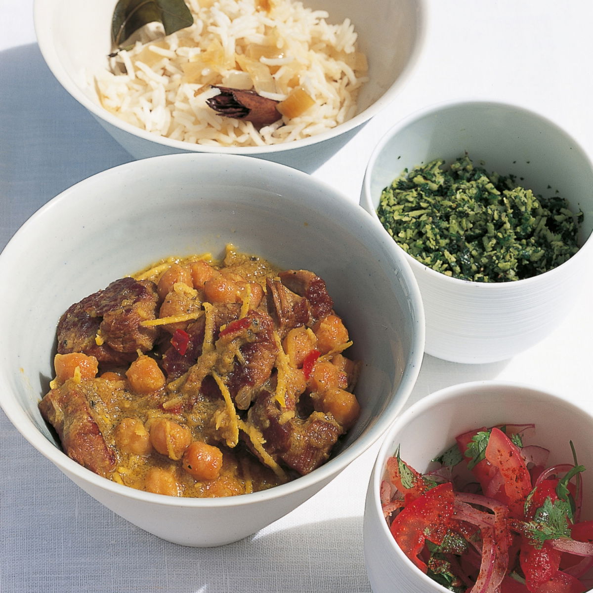 Htc spiced lamb curry with chickpeas green coconut sambal and tomato and red onion pickle