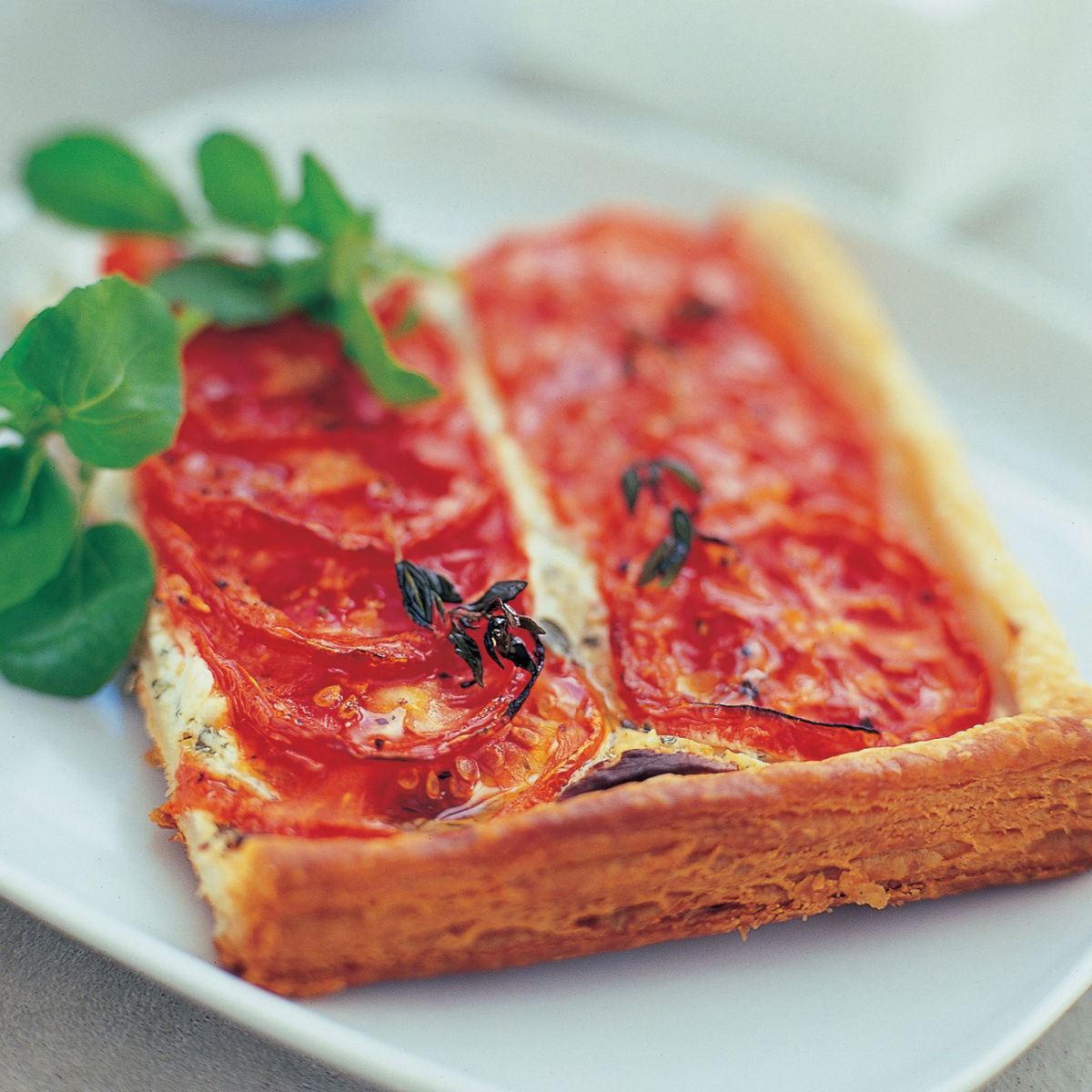 Vegetarian roasted tomato and goats cheese tart with thyme